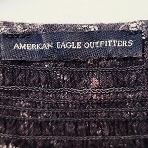 American Eagle blouse with smocking waist. Pre-loved good as new.